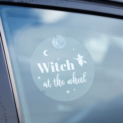 Window Sign Witch at the Wheel